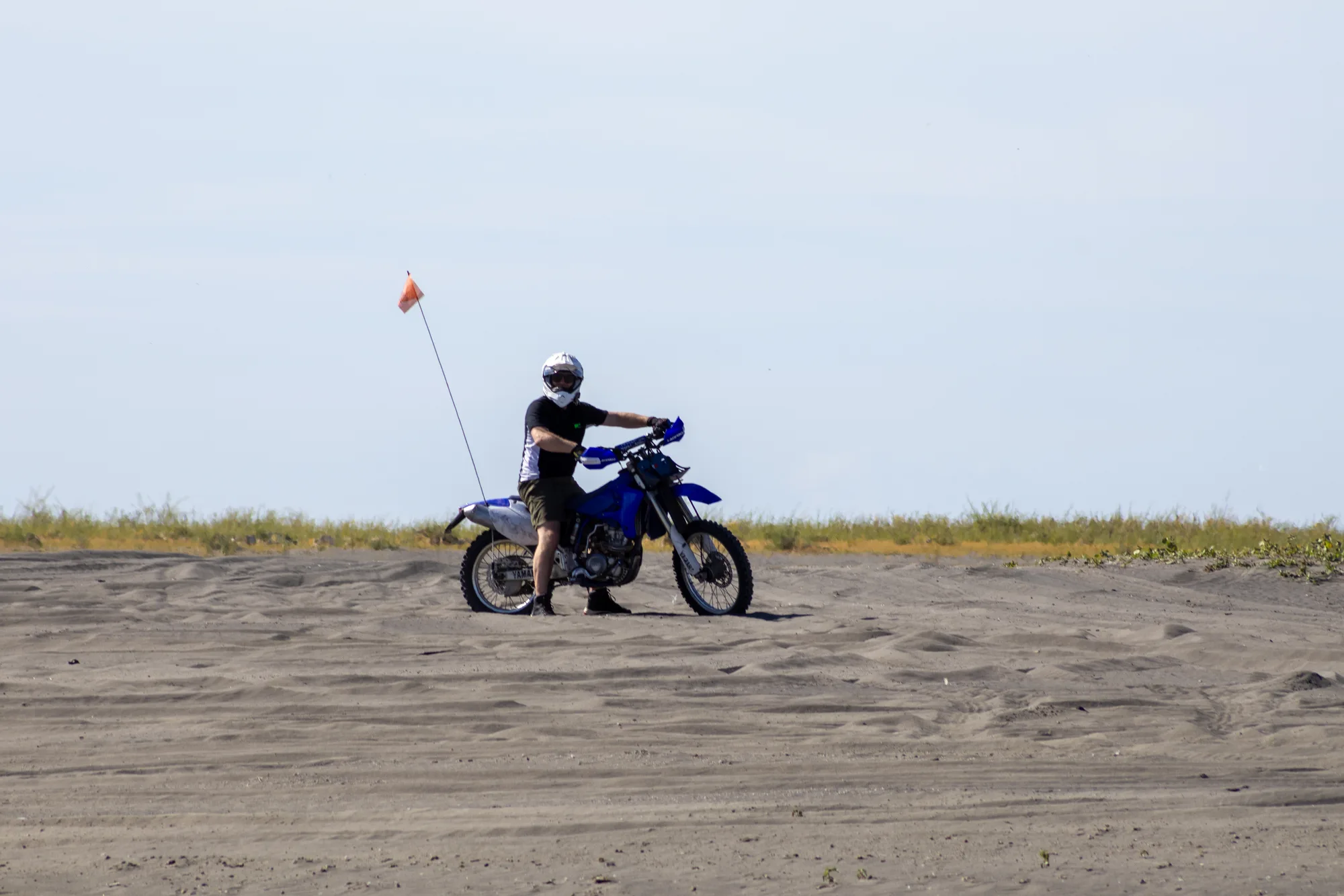 Dirt bike rider on a sandbar at Moses Lake