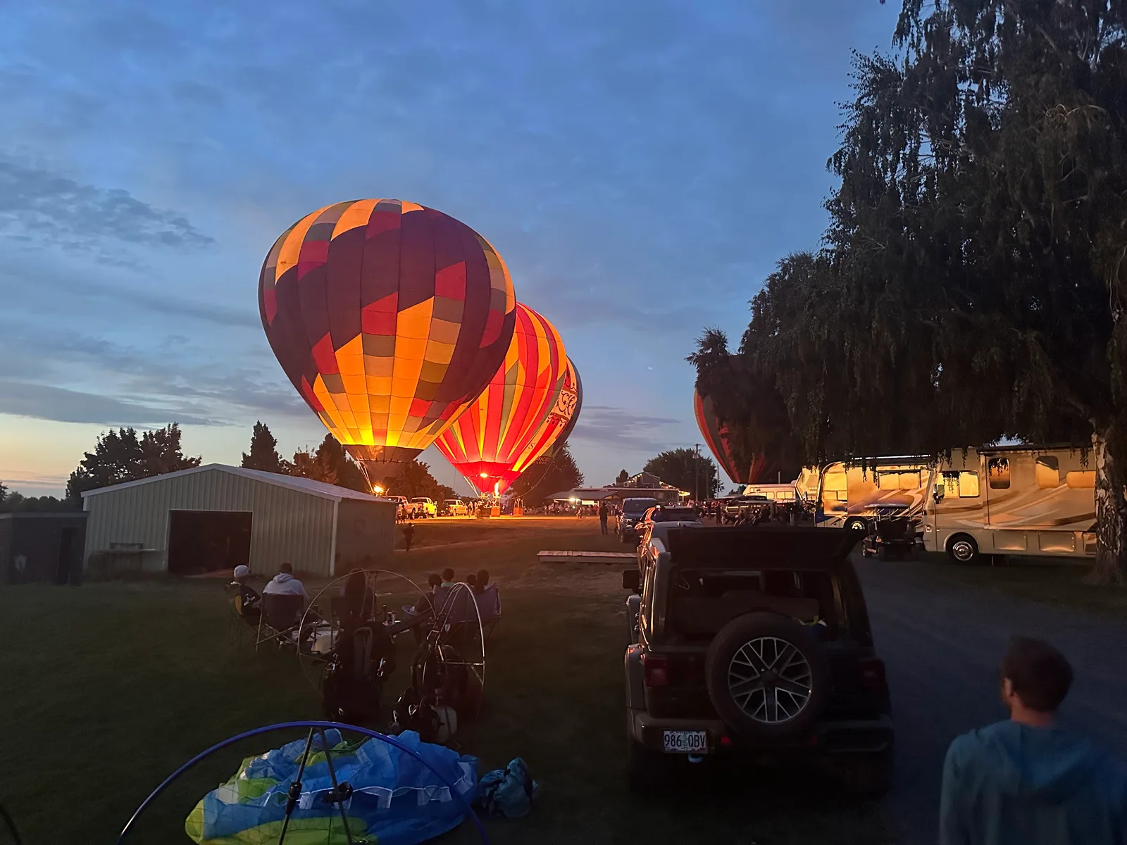 Pilot in a Moses Lake Paramotor Classic shirt with the gear bus